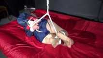 Sexy Sonja being tied and gagged with ropes and a clothgag on the ceiling overhead wearing a sexy blue shiny nylon shorts and a sexy blue/red rain jacket (Video)