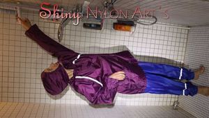 Sexy Sandra during her shaving cream action in the shower wearing a sexy blue shiny nylon rain pants and a shiny nylon purple rain jacket (Pics)