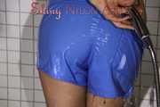 SEXY SANDRA in the shower with a sexy lightblue shiny nylon shorts and a top (Pics)
