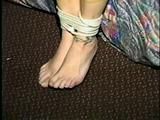 SEXY ONE IS WEARING A DOG COLLAR & CHAIN LEASH & GETS HER BARE FEET & TOES TIED & RUBBED (D35-16)