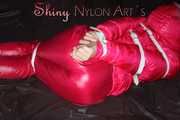 ***COURTNEY***NEW MODELL***being tied and gagged with ropes and a ballgag on a sofa wearing a pink rain pants and a pink doen jacket (Pics)