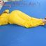 Stella putting on a sexy yellow rainwear combination with high heels waiting for you while lolling on bed (Pics)