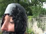 Watch Sandra enjoying Bondage  in her shiny nylon  Rainwear outside