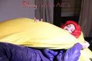 ***HOT HOT HOT*** SONJA wearing a sexy oldschool blue/red shiny nylon down suit while preparing her bed (Pics)