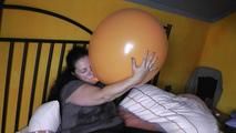 giant balloon in the bed