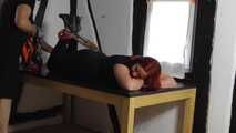 Aurora hogtied on table 1/2