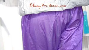 Mara tied, gagged and hooded in a shower wearing a sexy purple/silver sweat suit (Pics)