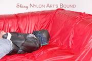 Sonja tied and gagged with ropes and a ball gag wearing a sexy grey shiny nylon rain pants and a black down jacket (Pics)