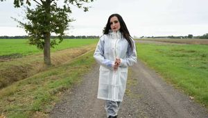 Miss Amira in Lepper nylon rain gear and transparent rain suit with Ilse Jacobsen coat