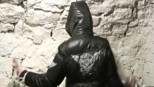 Archive girl tied, gagged and hooded in a cellar wearing a shiny black downcoat (Video)