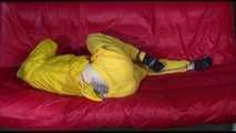 ***MARA*** ties and gagges with cuffs on the sofa wearing a supersexy oldschool yellow rain suit with hood (Video)