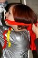 Nicole in an silver shiny PVC sauna suit tied and gagged in an cellar (Pics)