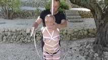  Zonah Bellum hogtied in the backyard