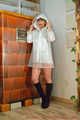 Our new Model in Miss Clara in white K-Way Jacket and transparent raincoat