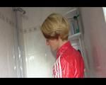 Sonja wearing a sexy red adidas shiny nylon jumpsuit while showering and messing up her clothes with shaving cream (Video)