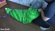 Green sleeping bag bondage and breathplay
