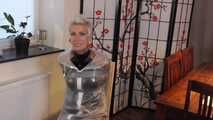 Miss Francine is bound and gagged in a nice short PVC dress covered with a transparent raincoat (extended version)