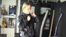 Watching sexy SONJA wearing a sexy black/blue rainwear combination and trainers during her workout (Video)