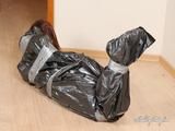 [From archive] Dominica Phoenix - packing in trash bag