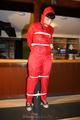 Jill bound in a red nylon rainsuit