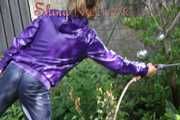 Watching sexy Sandra watering the flowers in the garden and lolling in the sun wearing a sexy blue shiny nylon rain pant and a purple down jacket (Pics)