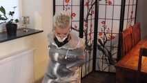 Miss Francine is bound and gagged in a nice short PVC dress covered with a transparent raincoat (extended version)