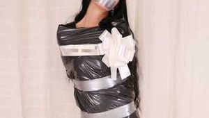 Marvita - Self mummified in trash bag