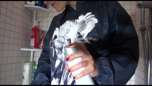 SEXY SANDRA wearing blue rainwear while having fun in the shower with shaving cream and water (Video)