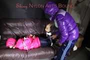 SEXY SANDRA being tied and gagged and hooded from Sexy Stella both wearing sexy shiny nylon rainwear and downwear (Pics) 