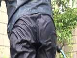 Watch Chloe gardening in her shiny nylon Rainwear