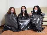 Lucky, La Pulya und Xenia - Trio Ball in Müllsäcken gebunden 02