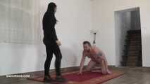 Mistress Dyanna gives the slave a painful gift