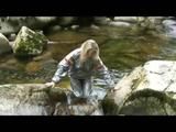 Sophie enjoying the water and weather on a river wearing supersexy grey sauna pvc rainwear (Video)