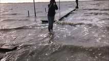 Rubber boot mistress at the North Sea beach for my welliefans