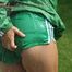 Watching sexy Sandra wearing a sexy green shiny nylon shorts and a green shiny nylon rain jacket enjoying the garden shower (Pics)