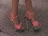 pink platform heels dangling