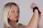 Playboy model Brittany wearing a black G-Shock left AND right!  