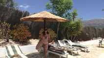 Little Red Girl suspended on the parasol