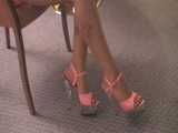 pink platform heels dangling