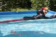 Mara sunbathing and swimming wearing supersexy crazy sensation shiny nylon downwear (Pics)