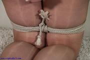 Strong rope bondage in tights