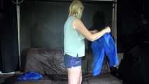 Watching sexy Pia wearing a sexy blue shiny nylon shorts and a tshirt while preparing her bed (Video)