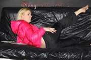 Watching sexy Pia wearing  a sexy black shiny nylon rain pants and a pink down jacket enjoying herself and lolling on the sofa (Pics)