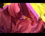 Lucy wearing a supersexy pink rainwear combination lolling in bed (Video)