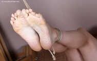 Amanda  . tied nude and tickled