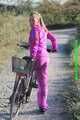 Watch Sandra enjoying her shiny nylon Suit riding a Bike