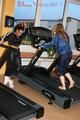 Stella and Leonie during their workout on the treadmill both wearing shiny nylon rainwear (Pics)