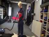 Watch sonja cleaning the room in her shiny nylon Rainwear