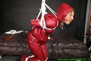 Watch Sandra bound gagged and Pantyhooded wearing her shiny nylon Rainwear