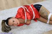 Red topless lady hogtied